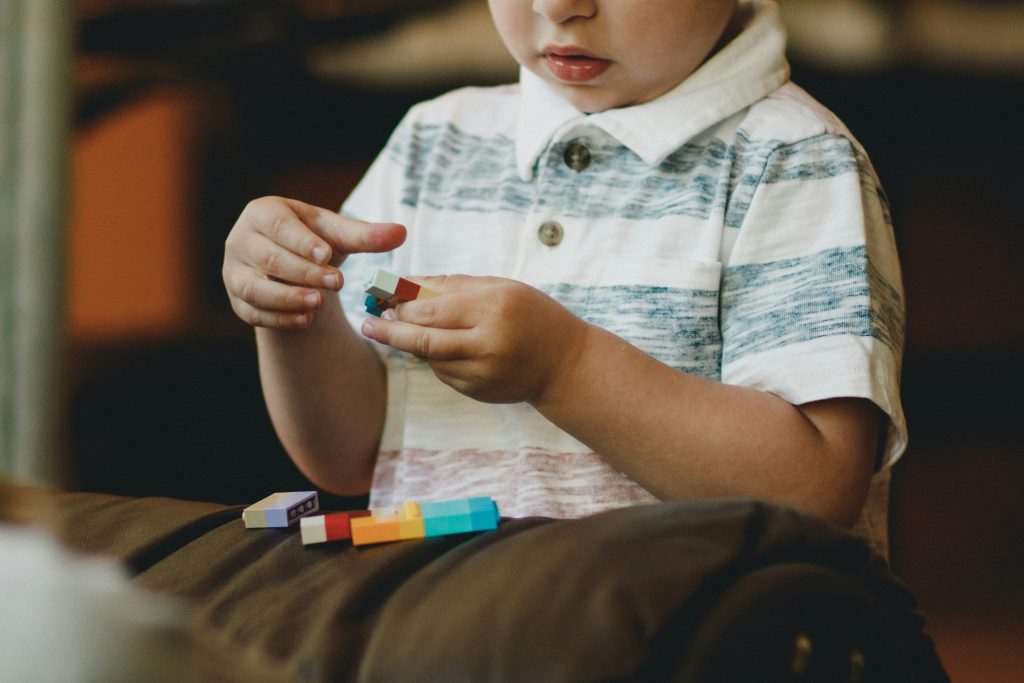 Young by playing with lego or bricks